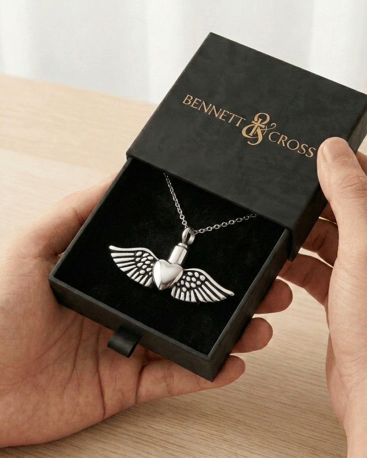The Winged Heart in its black Bennett & Cross gift box